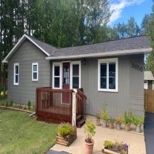 Installed Mastic Board & Batten Vertical Vinyl Siding, Thermo-Tech Full-Frame Replacement Windows, Ledgestone Versetta Accent Stone in Plover, WI 0