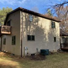 LP Diamond Kote Pre-Finish lap siding, and trim, Versetta Accent Stone, Waudena Millwork Entry Door, Titan Clad Overhead Garage Door Frame in Wisconsin Rapids, WI 1