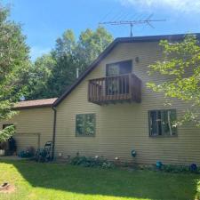 LP Diamond Kote Pre-Finish lap siding, and trim, Versetta Accent Stone, Waudena Millwork Entry Door, Titan Clad Overhead Garage Door Frame in Wisconsin Rapids, WI 9