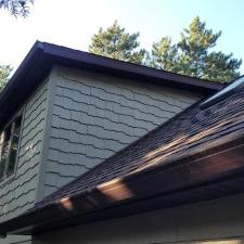 LP Diamond Kote Pre-Finish lap siding, and trim, Versetta Accent Stone, Waudena Millwork Entry Door, Titan Clad Overhead Garage Door Frame in Wisconsin Rapids, WI 13