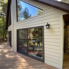 LP Diamond Kote Pre-Finish lap siding, and trim, Versetta Accent Stone, Waudena Millwork Entry Door, Titan Clad Overhead Garage Door Frame in Wisconsin Rapids, WI 3