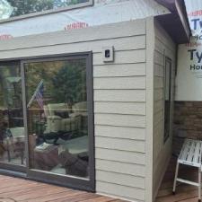 LP Diamond Kote Pre-Finish lap siding, and trim, Versetta Accent Stone, Waudena Millwork Entry Door, Titan Clad Overhead Garage Door Frame in Wisconsin Rapids, WI 4