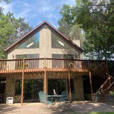 LP Diamond Kote Pre-Finish lap siding, and trim, Versetta Accent Stone, Waudena Millwork Entry Door, Titan Clad Overhead Garage Door Frame in Wisconsin Rapids, WI 6