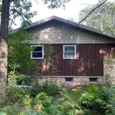 Mastic Carved Wood & Board and Batten Vinyl Siding, Soffit & Fascia, Seamless Gutters, AZEK PVC Post Cladding Trim, and Titan Clad Garage Door Installation in Steven's Point, WI 10