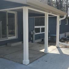 Mastic Carved Wood & Board and Batten Vinyl Siding, Soffit & Fascia, Seamless Gutters, AZEK PVC Post Cladding Trim, and Titan Clad Garage Door Installation in Steven's Point, WI 13