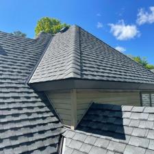 Mastic Carved Wood & Board and Batten Vinyl Siding, Soffit & Fascia, Seamless Gutters, AZEK PVC Post Cladding Trim, and Titan Clad Garage Door Installation in Steven's Point, WI 16