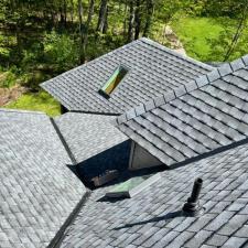 Mastic Carved Wood & Board and Batten Vinyl Siding, Soffit & Fascia, Seamless Gutters, AZEK PVC Post Cladding Trim, and Titan Clad Garage Door Installation in Steven's Point, WI 17