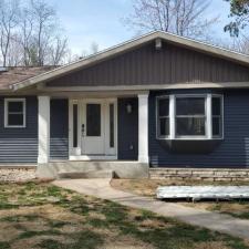 Mastic Carved Wood & Board and Batten Vinyl Siding, Soffit & Fascia, Seamless Gutters, AZEK PVC Post Cladding Trim, and Titan Clad Garage Door Installation in Steven's Point, WI 1