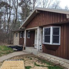 Mastic Carved Wood & Board and Batten Vinyl Siding, Soffit & Fascia, Seamless Gutters, AZEK PVC Post Cladding Trim, and Titan Clad Garage Door Installation in Steven's Point, WI 2