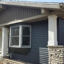 Mastic Carved Wood & Board and Batten Vinyl Siding, Soffit & Fascia, Seamless Gutters, AZEK PVC Post Cladding Trim, and Titan Clad Garage Door Installation in Steven's Point, WI 3