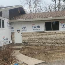 Mastic Carved Wood & Board and Batten Vinyl Siding, Soffit & Fascia, Seamless Gutters, AZEK PVC Post Cladding Trim, and Titan Clad Garage Door Installation in Steven's Point, WI 8