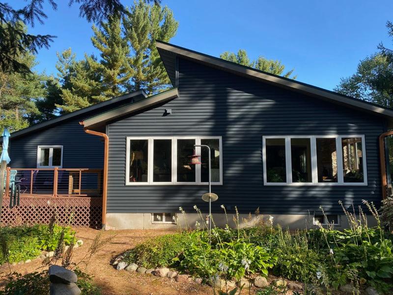 Mastic Carvedwood Vinyl Siding and Thermo-Tech Replacement Windows in Plover, WI