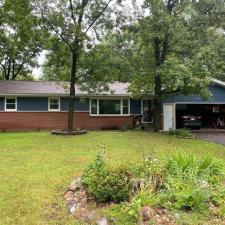 Replaced Original Masonite Siding With Carvedwood Vinyl Siding, Thermo-Tech Full-Frame Windows, Titan Clad Overhead Garage Door Frame in Wausau, WI 0