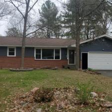 Replaced Original Masonite Siding With Carvedwood Vinyl Siding, Thermo-Tech Full-Frame Windows, Titan Clad Overhead Garage Door Frame in Wausau, WI 1