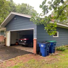 Replaced Original Masonite Siding With Carvedwood Vinyl Siding, Thermo-Tech Full-Frame Windows, Titan Clad Overhead Garage Door Frame in Wausau, WI 2