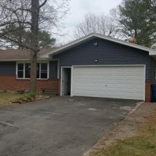 Replaced Original Masonite Siding With Carvedwood Vinyl Siding, Thermo-Tech Full-Frame Windows, Titan Clad Overhead Garage Door Frame in Wausau, WI 3