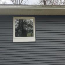 Replaced Original Masonite Siding With Carvedwood Vinyl Siding, Thermo-Tech Full-Frame Windows, Titan Clad Overhead Garage Door Frame in Wausau, WI 5