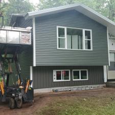 Standing Seam Metal Roof, Replacement Windows, Seamless Gutters, And Vinyl Siding Installation In Weston, WI 51