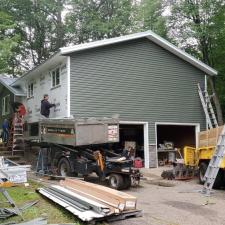 Standing Seam Metal Roof, Replacement Windows, Seamless Gutters, And Vinyl Siding Installation In Weston, WI 56