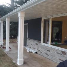 Mastic Carvedwood Vinyl Siding, Ledgestone Versetta Accent Stone, Garage Door Frame, Entry Door, Patio Door, Window, and Gutter Installation in Steven's Point, WI 7