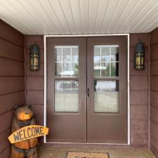 Mastic Carvedwood Vinyl Siding, Ledgestone Versetta Accent Stone, Garage Door Frame, Entry Door, Patio Door, Window, and Gutter Installation in Steven's Point, WI 8